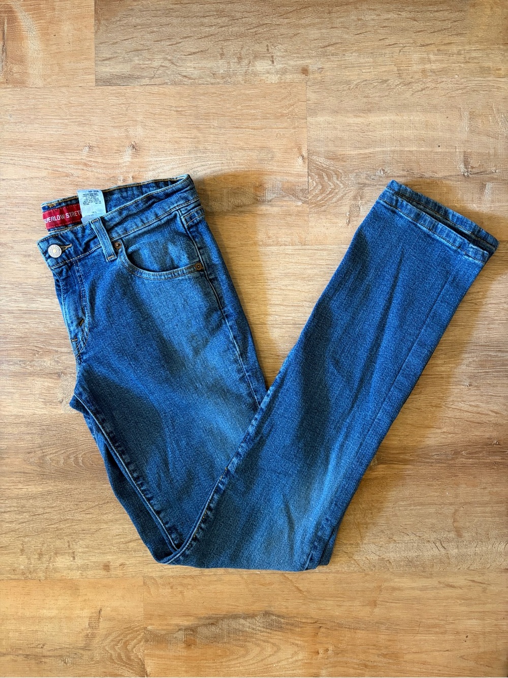 Vintage 90s Levi’s 518 Low Rise Superlow Bootcut Medium Wash Zip Fly Denim Jeans